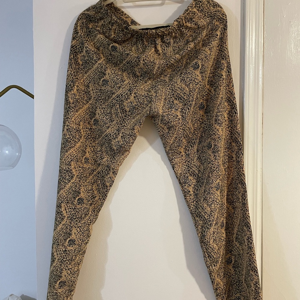 Cream and dark blue trousers